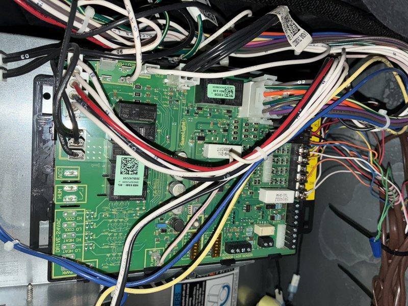 Performed annual furnace maintenance service on customer's HVAC system. Inspected primary heating unit components including circuit board and electrical connections. Checked all wiring harnesses and electronic control module for proper operation and verified system function.