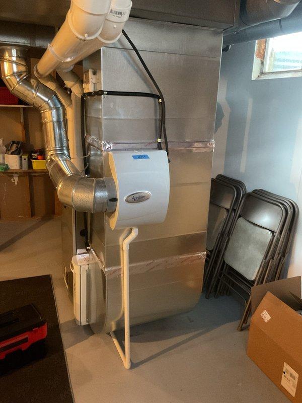 Conducted annual maintenance on customer's furnace system. Inspected and serviced the humidifier unit attached to the ductwork, ensuring proper connection and functionality. All components were found to be in good working condition with no issues detected.