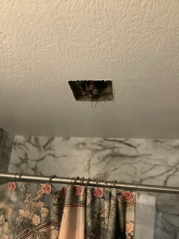 Responded to service call for non-functional bathroom exhaust fans. Inspected existing bathroom ceiling, created cutout for new fan installation. Installed client-provided bathroom exhaust fan in first bathroom and installed second bathroom fan with proper exterior venting. Additionally, repaired defective kitchen outlet and installed two new electrical outlets in separate rooms as requested.