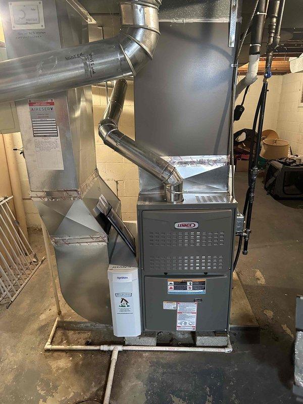 Completed installation of a new 80% efficient Lennox gas furnace with all required ductwork connections in the utility room. Installed and tested a carbon monoxide detector as part of the safety compliance measures. System was properly configured and verified for optimal performance.