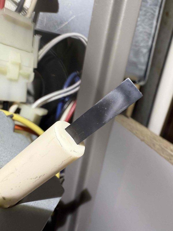 Responded to service call for 6-year-old furnace not operating properly. Upon inspection, identified faulty limit switch with damaged wiring insulation and discolored electrical contacts. Replaced limit switch, tested system operation, and verified proper heating function.
