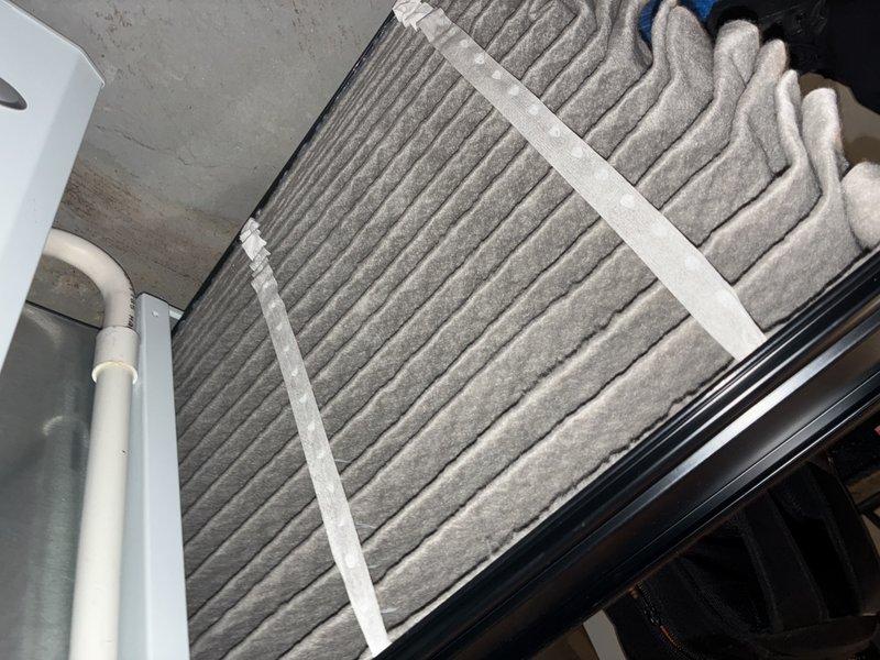 Performed annual furnace maintenance service, which included inspection of pleated air filtration system and control board assembly. Examined electronic components and wiring connections on PCB for proper functionality. Filter showed normal dust accumulation consistent with regular operation.