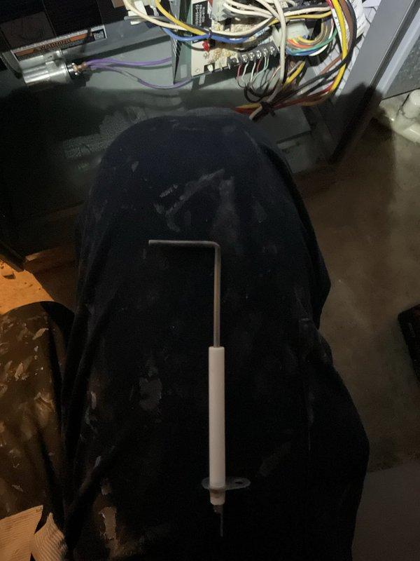 Performed scheduled heating system maintenance visit. Accessed control panel to inspect electrical connections and components. Used hex key tool to secure loose connections, ensuring proper system operation and safety.