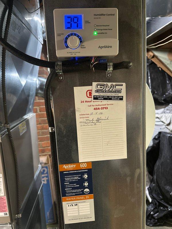 Successfully installed an AprilAire 600 humidifier with digital control panel (model 60) on the client's HVAC system. The unit is functioning properly with humidity reading at 39% and the "Humidifier On" indicator illuminated. Installation included proper connection of water supply, drainage, and electrical components with all connections secured and tested.