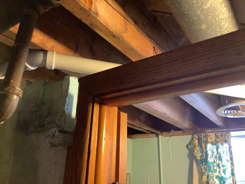 Replaced old drum trap and associated pipe work for the bathtub drainage system. Installed new PVC P-trap configuration with multiple joints and connectors to ensure proper drainage. All materials were ordered for will-call pickup as specified in the approved quote.