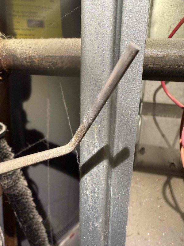 Responded to customer call reporting furnace unable to maintain temperature above 62°F despite thermostat replacement. Inspection revealed significant dust accumulation on blower wheel impeding proper airflow. Cleaned blower assembly and verified proper operation of temperature probe/sensor connections. System now functioning normally and maintaining set temperature.