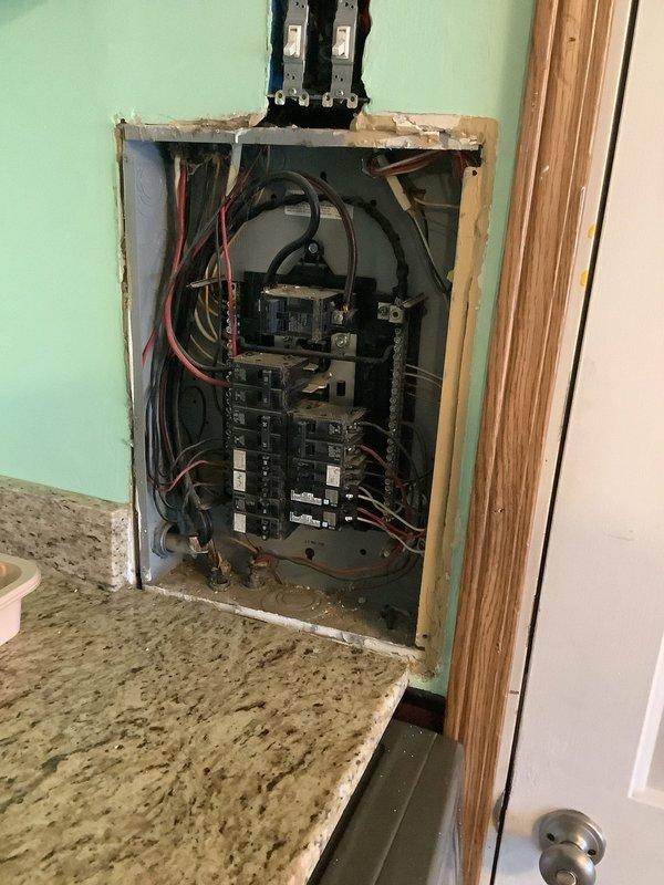 Performed electrical evaluation of residential panel experiencing potential power fluctuation issues. Inspected main breaker and circuit connections in the panel. Replaced standard outlets with GFCI outlets in required locations to improve safety and meet electrical code requirements.