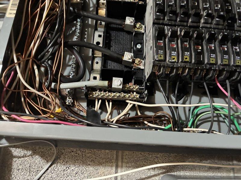 Conducted inspection of sub-panel and identified code violation per NEC 2023 250.6 where equipment grounding conductors (EGCs) were incorrectly terminated on the neutral bar. Documented the installation with photos showing the circuit breaker configuration and wiring arrangement. Informed customer that corrections are required to relocate EGCs to the proper grounding bar to eliminate objectionable current flow, and that verification photos can be submitted through VuSpex GO app.