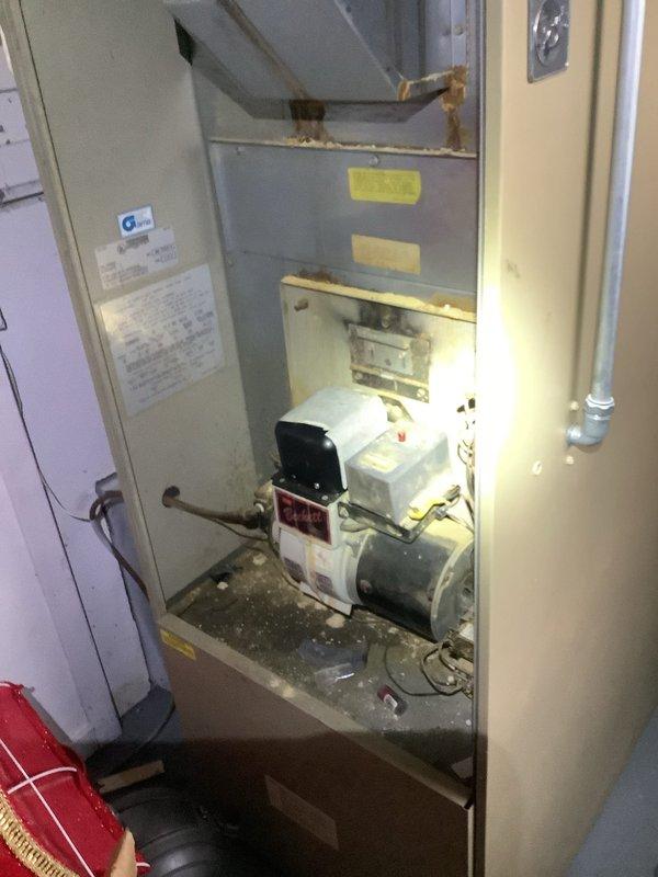 Responded to no-heat call for 10+ year old oil furnace. Diagnosed system after customer confirmed oil delivery was completed. Removed front panel to inspect internal components and identified fuel delivery issue. Removed and inspected pilot assembly, cleaned connections, and restored proper operation. System now functioning normally with adequate heat production.
