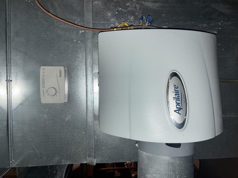 Performed preventative maintenance on 9-year-old furnace system. Inspected and replaced air filter with new pleated filter. Checked Aprilaire humidifier installation, ensuring proper connection to copper tubing and verifying control panel functionality. System is operating normally with MVP valid through 2025.