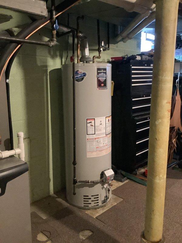 Responded to service call for Bradford White tanked water heater. Performed scheduled maintenance inspection on residential unit with Defender Safety System. Verified proper operation of all connections including copper supply lines and exhaust venting. System functioning normally after service.