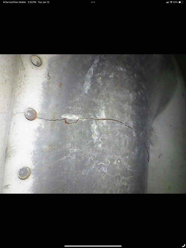 Diagnosed and repaired 10-year-old furnace exhibiting squealing noise, identifying a significant horizontal crack in the heat exchanger that was causing operational issues. Additionally, serviced hot water tank by cleaning and adjusting the thermocouple to resolve pilot light failure.