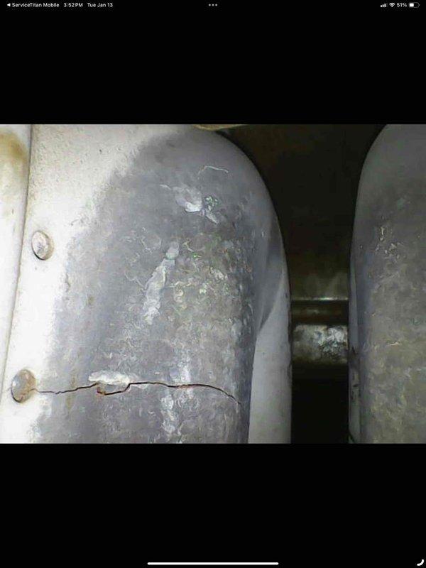 Diagnosed and repaired 10-year-old furnace exhibiting squealing noise, identifying a significant horizontal crack in the heat exchanger that was causing operational issues. Additionally, serviced hot water tank by cleaning and adjusting the thermocouple to resolve pilot light failure.