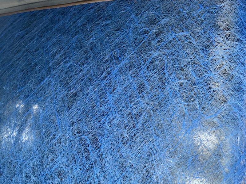 Performed routine heating maintenance service on 13-year-old HVAC system. Inspected ventilation components and identified dust accumulation on cooling fins. Examined insulation material which appears to be in standard condition with no visible damage.