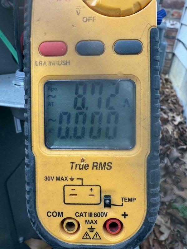 Performed scheduled maintenance on 2-year-old heating system. Conducted PCB inspection of control board with focus on DIP switch settings. Verified electrical readings using multimeter, confirming proper amperage (0.1A) and voltage (0.00V) at key connection points.