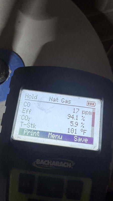 Performed scheduled BS-MVP heating maintenance visit on 14-year-old system. Conducted combustion analysis with gas analyzer showing CO at 17ppm, O2 at 94.1%, CO2 at 5.9%, and exhaust temperature at 101°F. Inspected gas valve and connection components, confirming proper operation of system.