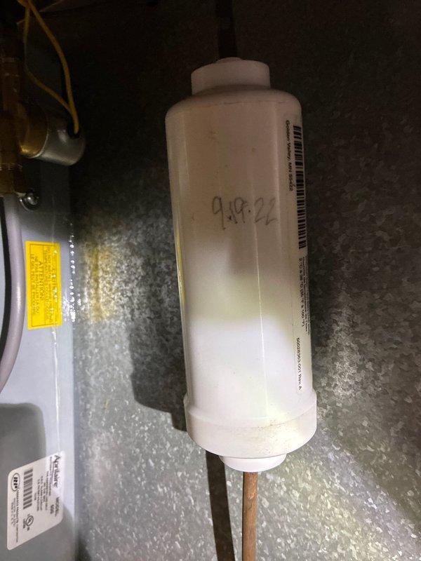 Completed routine maintenance on 3-year-old JG furnace. Inspected control board circuitry and connections, confirming proper operation of all electrical components. Checked condensate trap (dated 9/9/22), verified proper drainage and functionality with no blockages present.