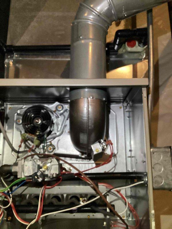 Performed comprehensive furnace tune-up on 2-year-old system as requested by customer. Inspected and cleaned interior components including blower motor assembly, draft inducer, and electrical connections. Verified proper operation of all mechanical systems and checked pressure tubes connecting to switches for proper positioning and functionality. All systems testing within normal parameters after service.