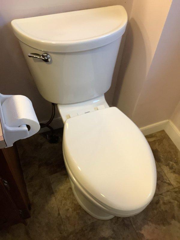 Replaced severely corroded toilet flange and installed new toilet as per work order. Removed old rusted fixture, prepared mounting surface, and successfully completed installation of customer-supplied white porcelain toilet with all necessary connections.