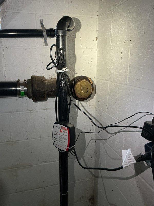 Responded to service call regarding water leakage from dishwasher and backup issues affecting toilet and shower. Inspection revealed drainage system blockage in the main waste line. Cleared obstruction and verified proper drainage function through all fixtures, with particular attention to the PVC junction connections in basement utility area.