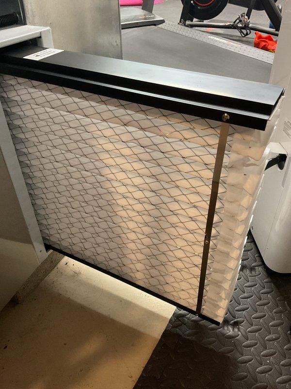 Performed scheduled tune-up on 5-year-old furnace originally installed by Blind and Sons. Inspected air filtration system and found filter in good condition with proper installation. Examined humidifier component, noting slight discoloration on evaporative pad suggesting normal wear. All systems verified operational with no issues detected.