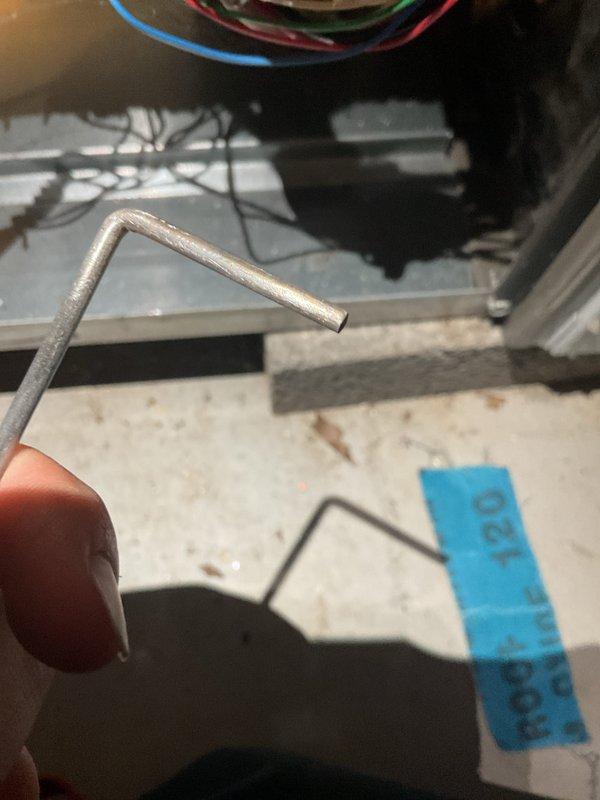 Performed annual maintenance on 1-year-old gas furnace. Inspected water heater and relief valve system, noting normal operation with no visible leaks or corrosion issues at connection points. Used hex key to access and check furnace components, confirming proper operation of heating system with all electrical connections secure.