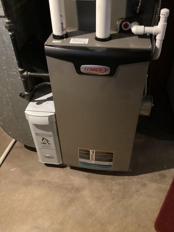 Performed routine maintenance tune-up on Lennox furnace system. Inspected ductwork to evaluate need for cleaning. Checked PVC exhaust and intake connections, verified proper operation of the unit, and examined the attached humidifier. System is functioning within normal parameters with no immediate issues detected.