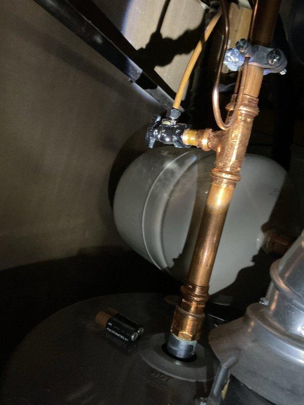 Responded to emergency service call to replace main water valve and humidifier valve located above water heater before scheduled water shutoff. Successfully installed new brass valve assembly on copper supply line with proper fittings and verified secure connections. Completed installation with no leaks observed during testing.
