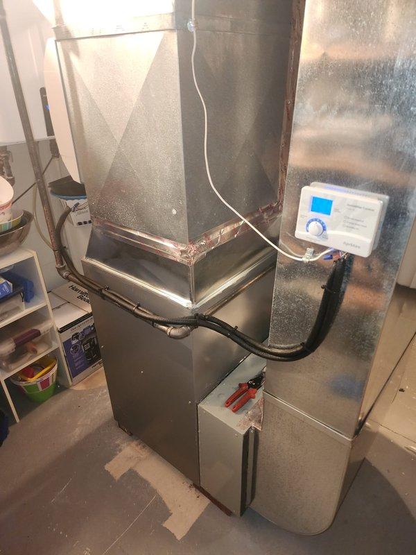 Successfully installed a new 90,000 BTU furnace with accompanying ductwork and PVC venting system. Properly sealed all ductwork connections with metal tape and connected the digital thermostat control panel. System was tested and confirmed to be functioning correctly with all components properly installed.