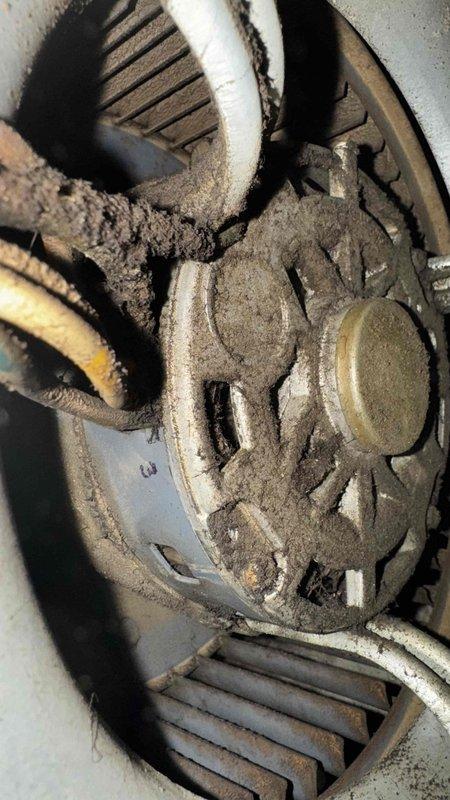 Responded to no heat complaint on 10+ year old system. Inspection revealed severely corroded heat exchanger tube with significant rust damage, compromising system safety and efficiency. Additionally found blower assembly heavily contaminated with dust and debris, restricting proper airflow and causing continuous blower operation. Recommended full system replacement due to age and critical component failure.