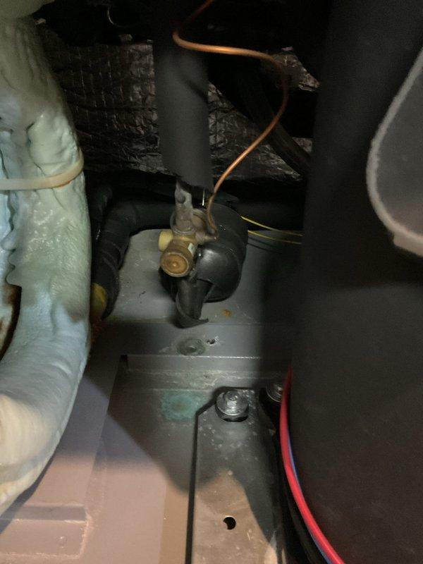 Rescheduled geothermal service appointment as requested by customer. Diagnosed and identified refrigerant leak in the system. Performed comprehensive inspection of the Aprilaire humidification component and verified proper operation of the digital control interface showing 40% humidity reading.