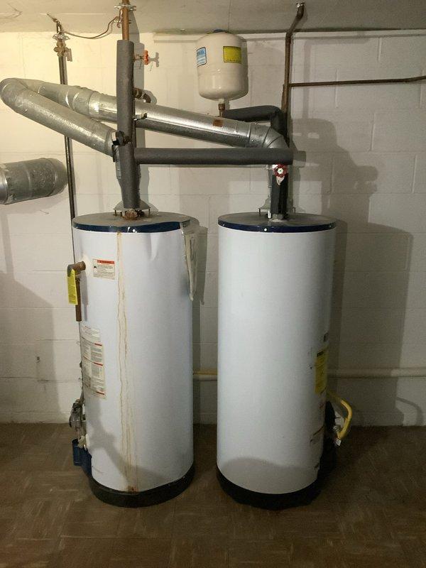 Performed diagnostic assessment of slow draining bathroom fixtures and gurgling drain noises. Located main line blockage causing multiple fixture drainage issues including bathroom sink, tub, and basement toilet. Cleared obstruction in main sewer line using power auger, successfully restoring proper drainage function throughout the system and eliminating gurgling sounds during toilet flushing.