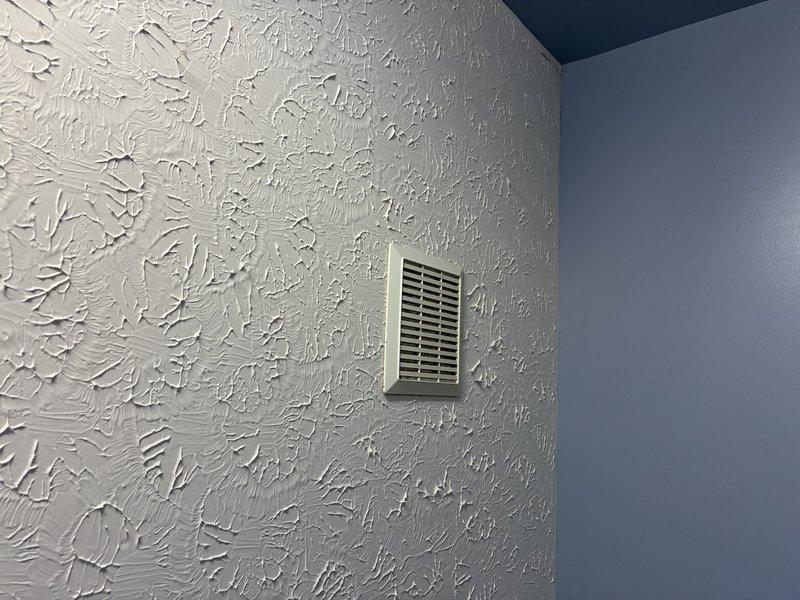 Responded to service call for non-operational bathroom exhaust fan. Upon inspection, accessed attic space to examine fan unit and ductwork. Located ventilation grille in bathroom with proper airflow path. Diagnosed electrical issue with fan motor, replaced component and verified proper operation before completing service.