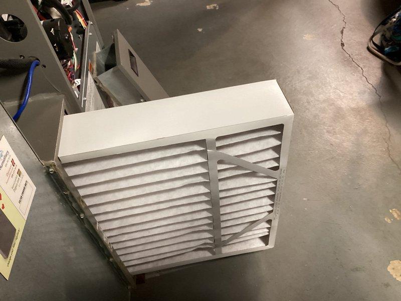 Performed routine maintenance on 4-year-old heat pump system. Inspected and verified condition of evaporative pad/humidifier element showing normal wear. Examined and confirmed proper installation of air filter in the air handler unit. All components functioning correctly with no issues identified.
