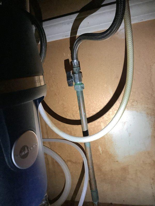 Responded to service call to install new dishwasher and remove old unit. Inspected and connected plumbing components including water supply lines and drainage system. Properly installed P-trap assembly with PVC piping and verified all connections were secure with no leaks present.