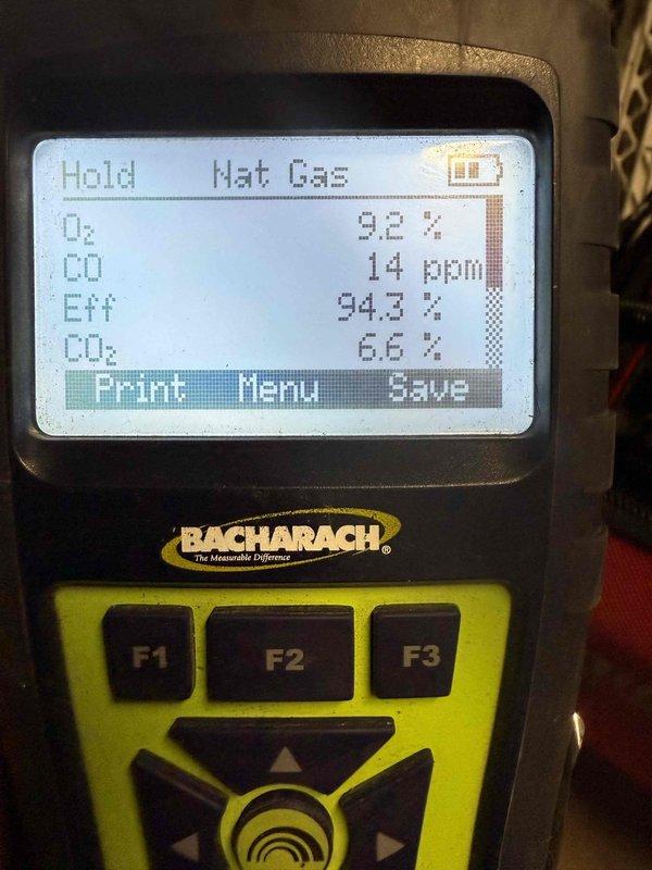 Performed annual heating maintenance visit on 10-year-old system. Conducted combustion analysis with Bacharach analyzer showing excellent efficiency ratings (94.3%) with proper CO (14ppm) and CO₂ (6.6%) levels. Inspected internal control board and wiring connections, all components functioning normally.