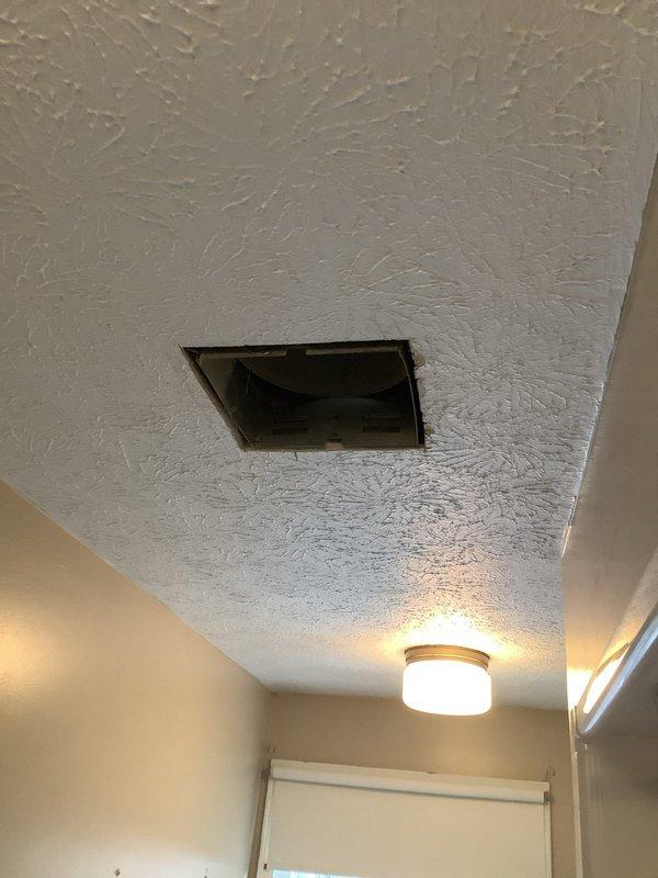Replaced faulty bathroom exhaust fan switch with new stacked switch configuration. Accessed ventilation system through ceiling panel and crawl space to complete proper installation of exhaust components. All electrical connections were properly terminated and system functionality was verified.