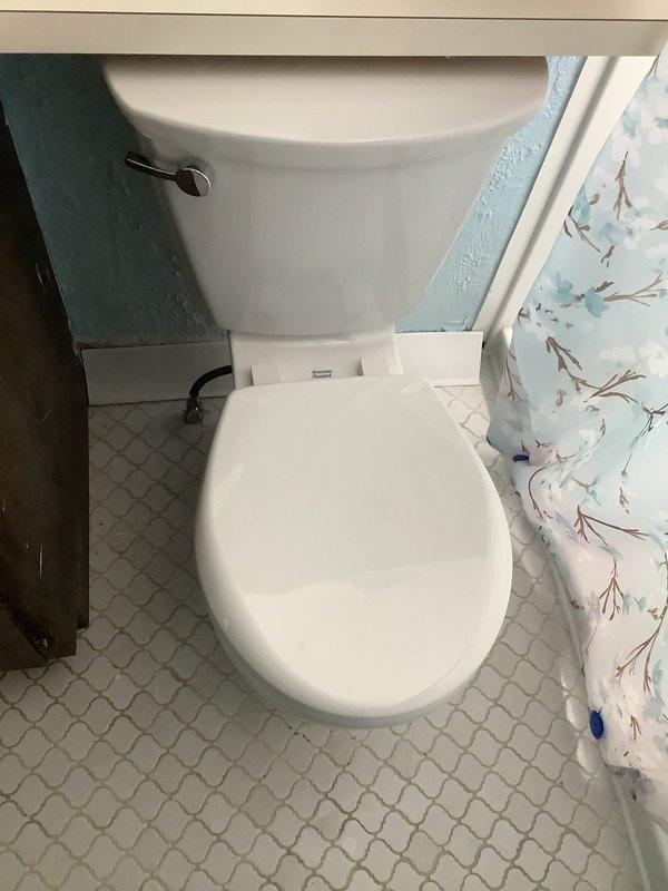 Completed installation of two new toilets with new shutoff valves as specified. Also installed new shutoff valves under kitchen sink to accommodate dishwasher connection. All materials were pre-ordered and installed according to service specifications.