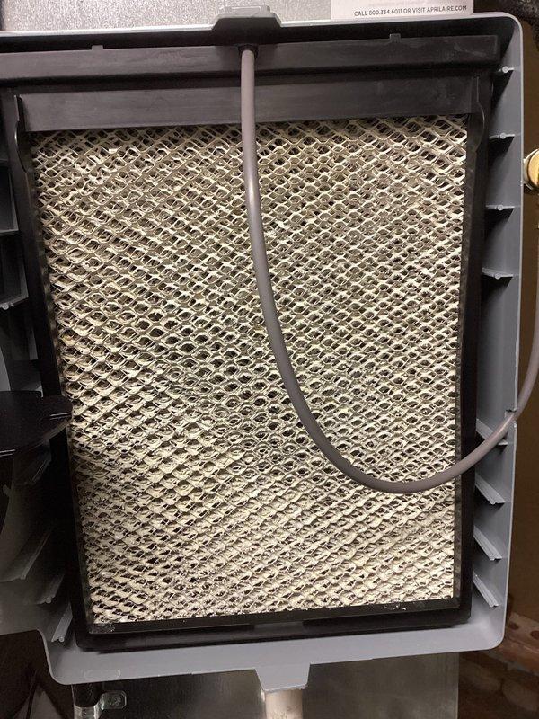 Performed scheduled maintenance on natural gas furnace (non-MVP model). Inspected system components, removed and replaced dirty air filter with visible dust accumulation. System is functioning properly with no issues identified.