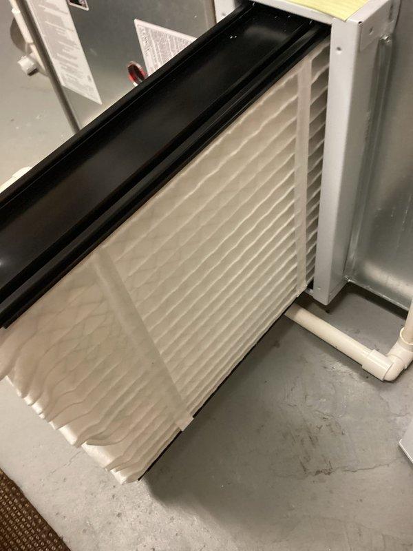 Performed scheduled maintenance on natural gas furnace (non-MVP model). Inspected system components, removed and replaced dirty air filter with visible dust accumulation. System is functioning properly with no issues identified.