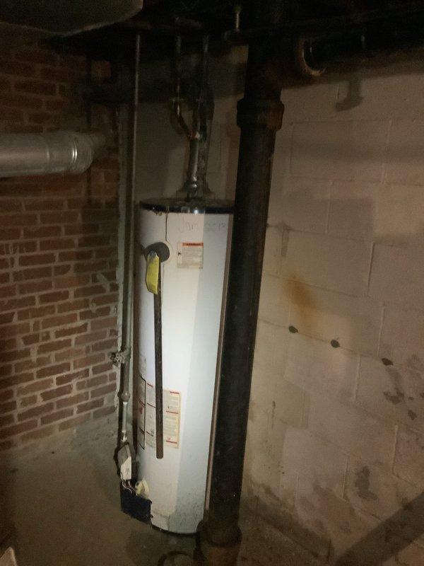 Completed installation of an 80-gallon high-efficiency water heater in basement utility area. Unit was properly connected to existing plumbing with new copper piping and shut-off valve. Installed drain pan beneath unit to prevent potential water damage and ensured all safety features were operational.