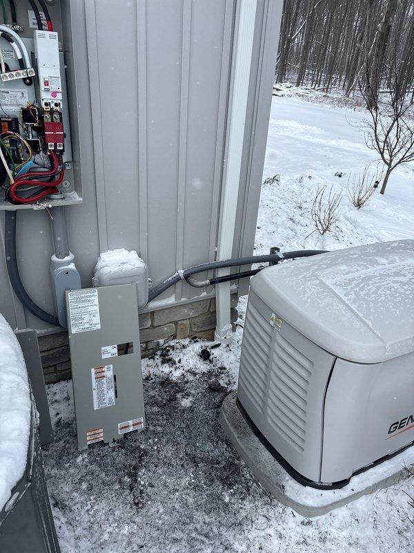 Installed 22kW whole home generator with integration to customer's existing transfer switch. Completed approximately 5' of gas line connection and verified proper electrical connections between the Generac unit, transfer switch, and main panel. System was successfully mounted on concrete pad with all necessary conduit runs and wiring completed according to specifications.