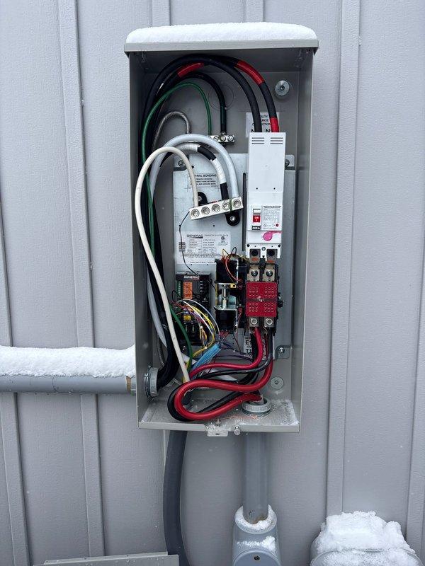 Installed 22kW whole home generator with integration to customer's existing transfer switch. Completed approximately 5' of gas line connection and verified proper electrical connections between the Generac unit, transfer switch, and main panel. System was successfully mounted on concrete pad with all necessary conduit runs and wiring completed according to specifications.