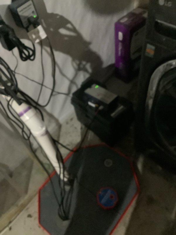 Completed replacement of maintenance-free batteries for two backup sump pumps in the home's utility area. Installed new batteries to ensure continued protection against water damage during power outages. System tested and verified operational with proper indicator lights functioning.