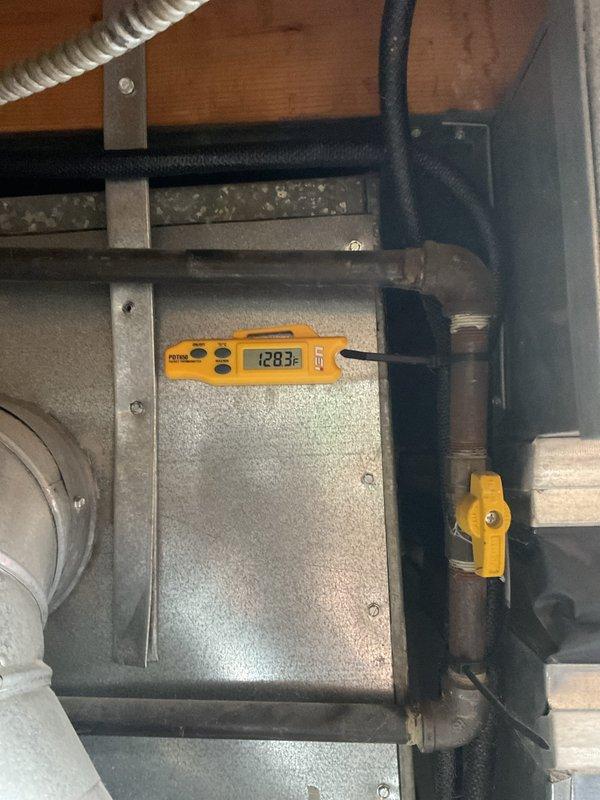 Performed scheduled furnace tune-up on 3-year-old unit. Conducted temperature differential testing (reading 128.3°F) and cleaned system components using hex key tools. All operations verified normal with no issues detected. System is operating within manufacturer specifications with MVP coverage extending through 2025.