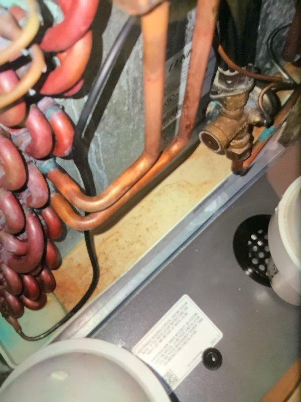 Completed routine maintenance on 9-year-old MVP furnace. Inspected and cleaned blower wheel assembly and heat exchanger components. System is functioning properly with all copper lines and connections in normal condition showing no signs of damage or severe corrosion.