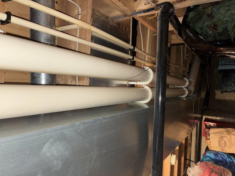Performed routine furnace maintenance as part of scheduled tune-up service. Inspected heating system components and plumbing infrastructure in basement area. System is covered under MVP protection plan through 2024; furnace age undetermined, water heater approximately 10 years old.
