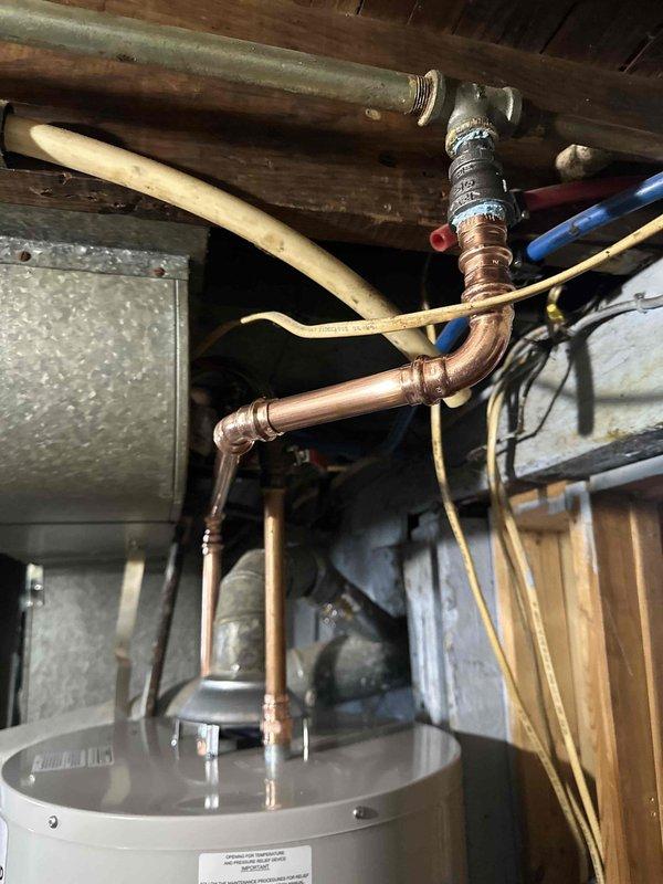 Completed installation of Lennox gas furnace system with connection to existing ductwork in residential basement mechanical room. Installed new 80 HWT water heater with proper copper pipe connections and shutoff valves. All systems tested and confirmed to be in proper working condition.