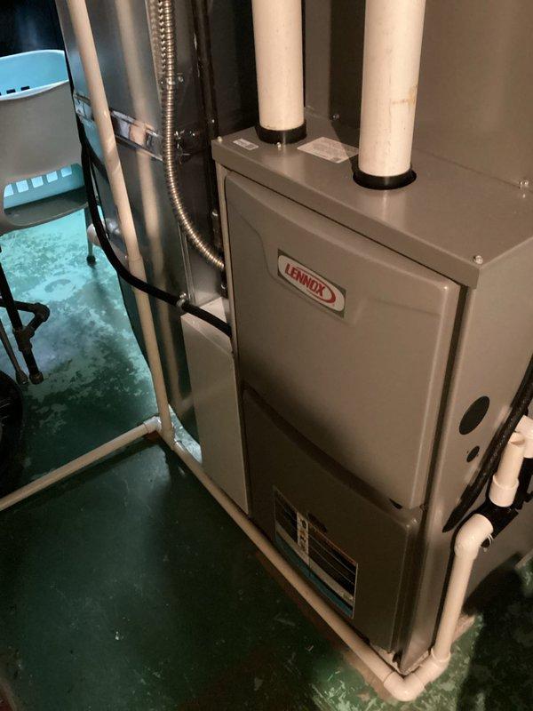Performed scheduled maintenance on 1-year-old Lennox furnace system. Inspected and cleaned air filter/evaporator coil, checked all connections and verified proper venting through PVC exhaust. System operating correctly with no issues identified.