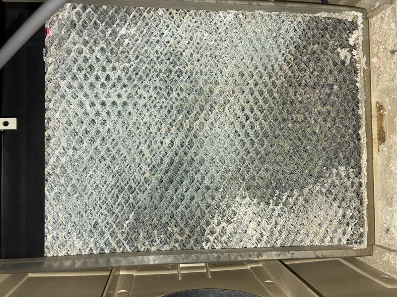 Performed annual maintenance on 6-year-old furnace system. Inspected ductwork and evaluated filter condition - discovered severely clogged filter with extensive dust and debris accumulation throughout pleated surfaces. Recommended immediate filter replacement to restore proper airflow and system efficiency.